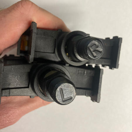 Bicycle pedals with Left and Right indicators on the ends of the threaded spindles